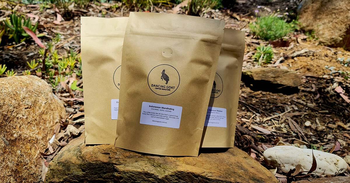A photo of three different Dancing Goat Coffee Roasters beans for sale